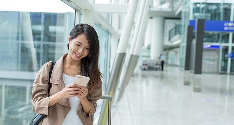 woman checking on cellphone